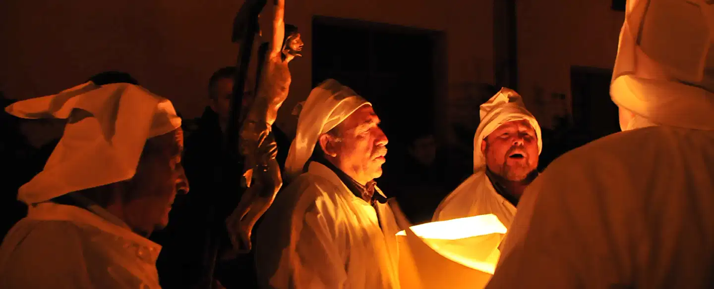 Holy Week Photo Experience in Castelsardo, Sardinia with Lunissanti torchlit procession and chants.