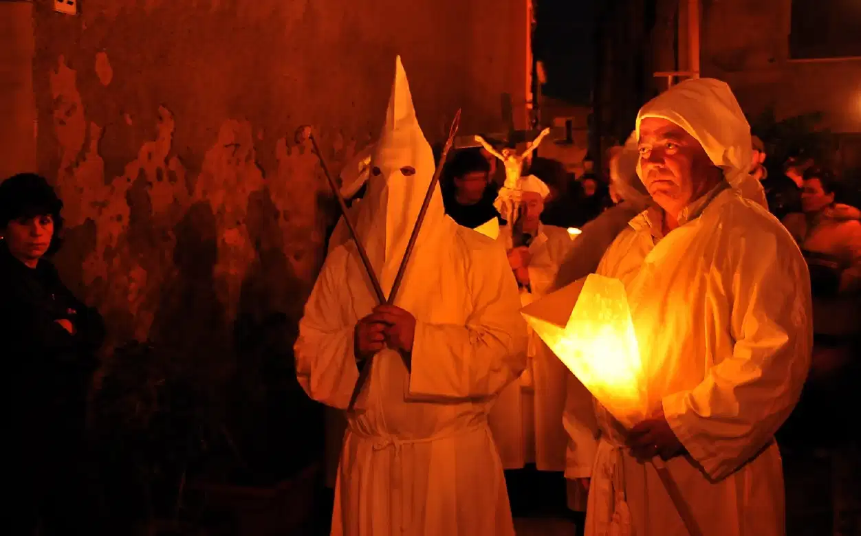 Holy Week Photo Experience in Castelsardo, Sardinia with Lunissanti torchlit procession and chants.