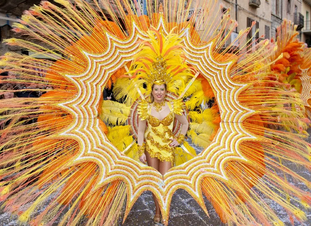 Tempio Pausania Carnival (Carnevale) Photo Tour in Sardinia capturing masks and Re Giorgio burning.