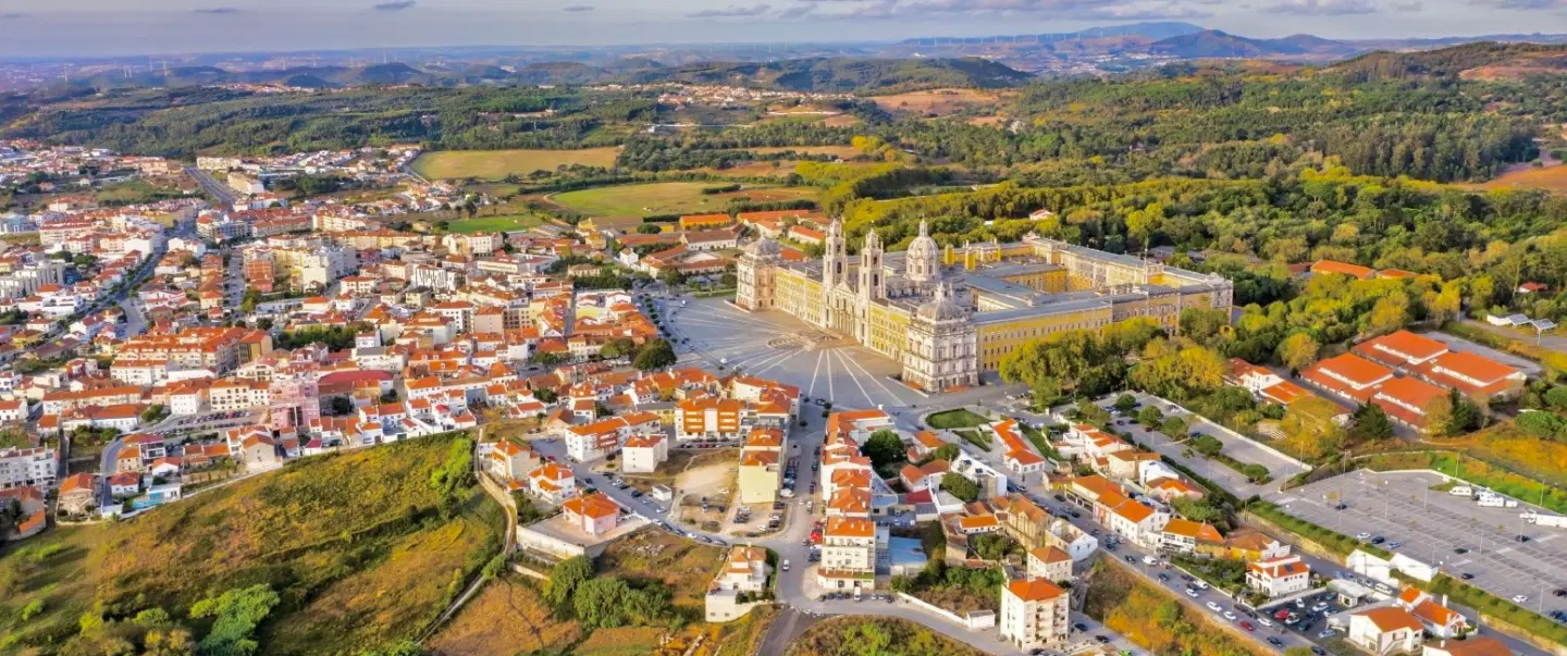 Day Trip from Lisbon to the UNESCO-listed Palace of Mafra and Ericeira, a charming fishing village.