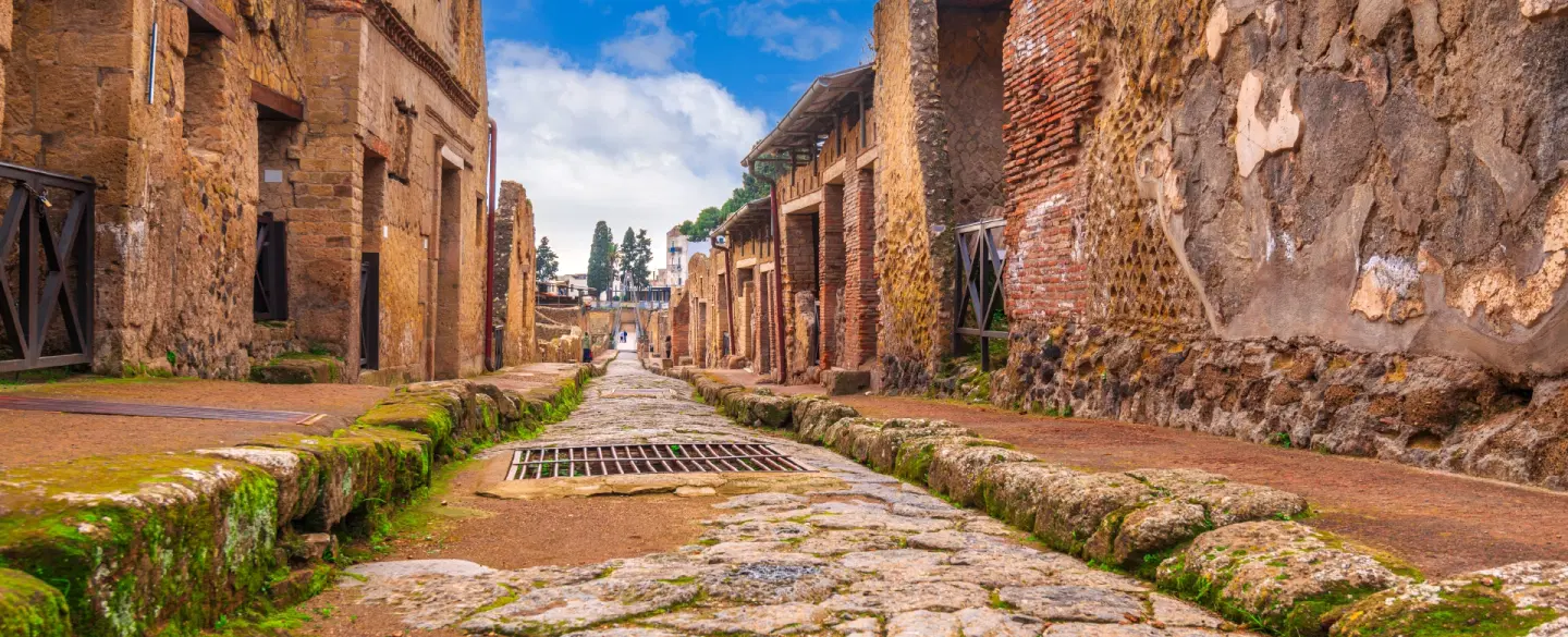 Walking Tour in Herculaneum near Naples, frozen by pyroclastic flows and preserved to this day.