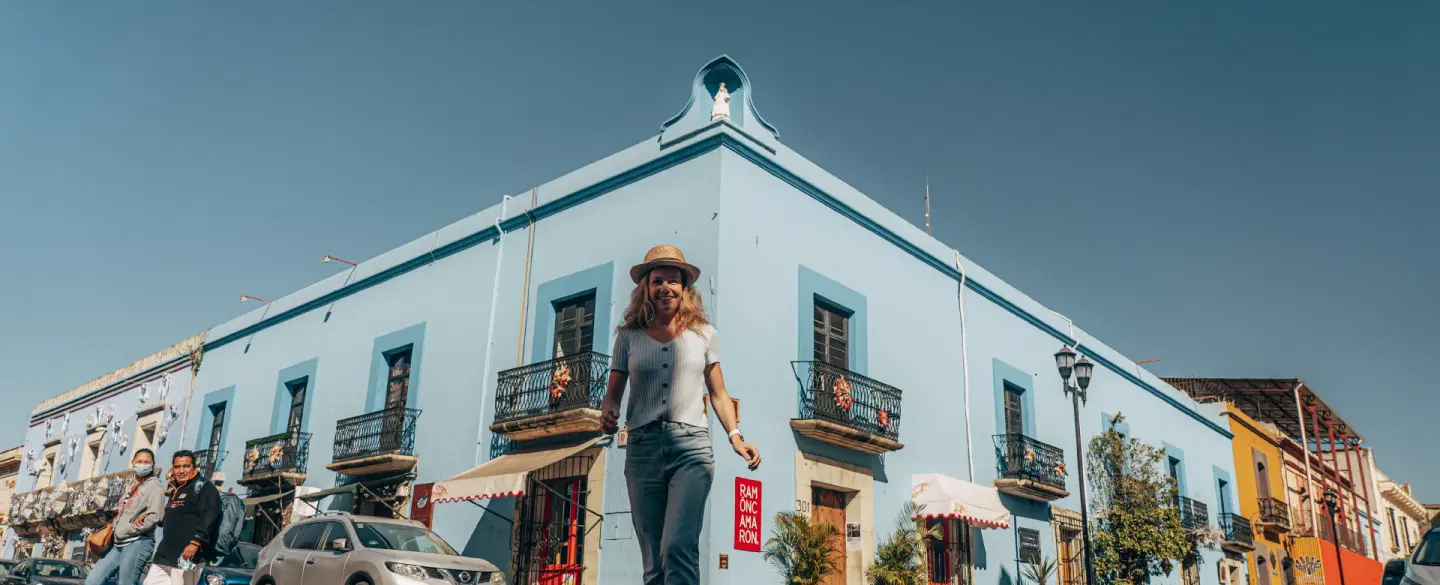 Portrait Photoshoot in historic Jalatlaco in Oaxaca with pastel streets, churches, and murals.