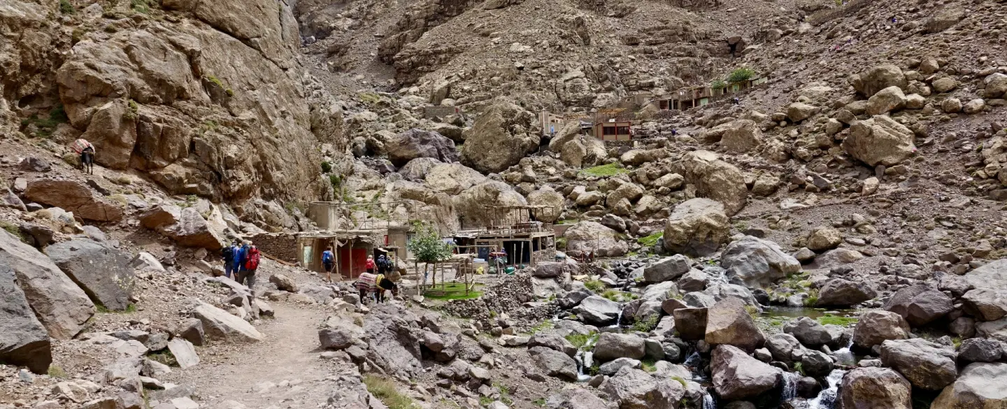 Hiking Trek to the sacred shrine of Sidi Chamarouch in Atlas Mountains from Imlil near Marrakesh.