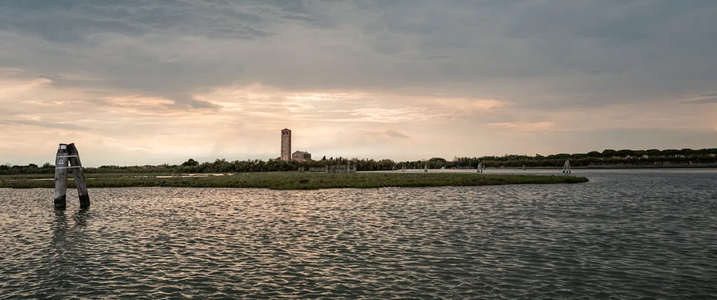 Boat Tour in Venice, savoring the timeless beauty of the city and its surrounding islands at sunset.
