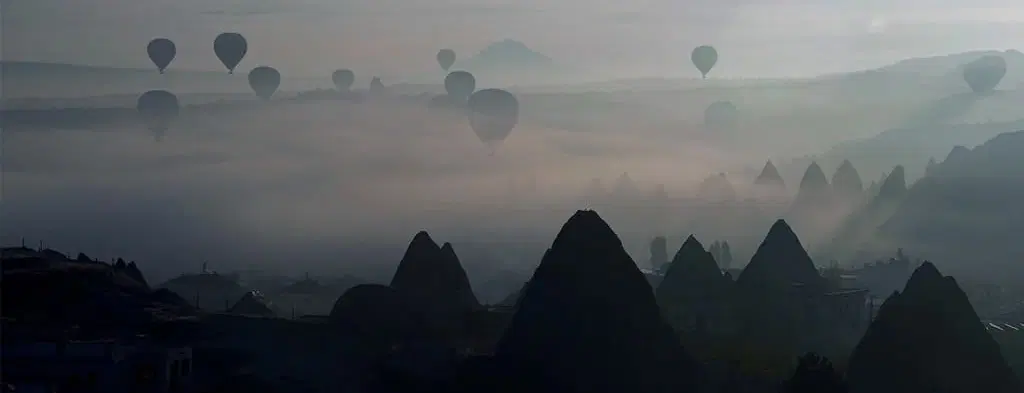 Sunrise Photography Tour in Cappadocia, capturing hot air balloons, valleys, and surreal landscapes.
