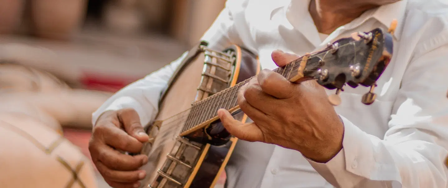 Storytelling Session in Fes: Moroccan folktales with live music & mint tea in a heritage setting.