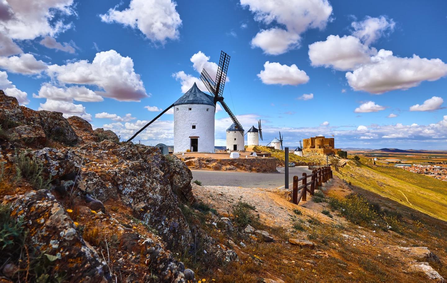 A road trip itinerary from Madrid to Porto via Toledo and Galicia, blending culture, drives, locals.