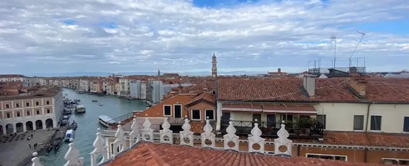 Walking Tour in Venice at sunrise through Piazza San Marco, quiet calli, and Rialto Market.
