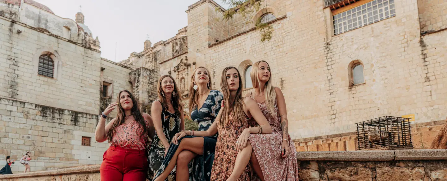 Portrait Photoshoot in historic Jalatlaco in Oaxaca with pastel streets, churches, and murals.
