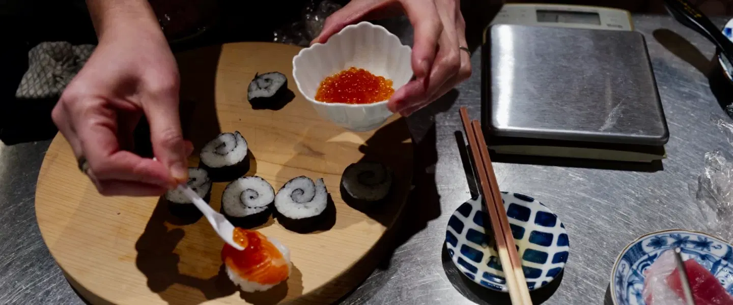 Cooking Demonstration in Kyoto with seasonal home cooking and sake pairings in a historic shop.