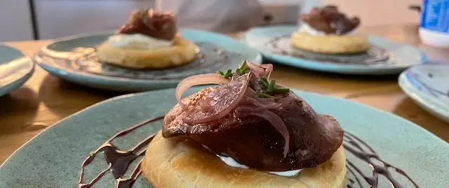 Dining Experience in Buenos Aires enjoying a curated five-course Argentine menu with wine pairings.