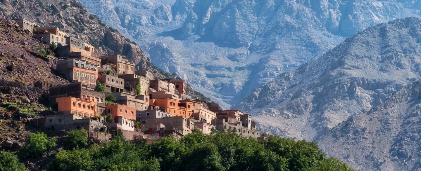 Hiking Trek past Berber villages and mountain passes of Atlas Mountains from Imlil near Marrakesh.