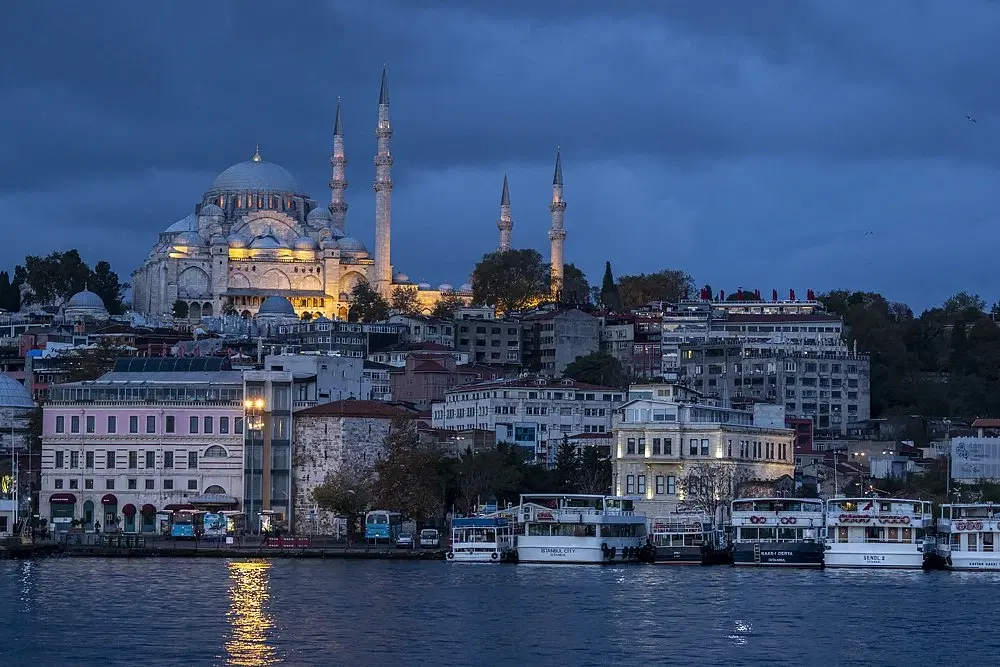 Sunrise Photo Walk in Istanbul: Galata Bridge, blue hour to golden hour, Bosphorus views, fishermen.