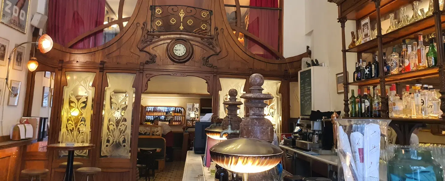 Barcelona Neighborhood Tour in El Raval: local life, hidden Gaudí, stained glass and Catalan lunch.