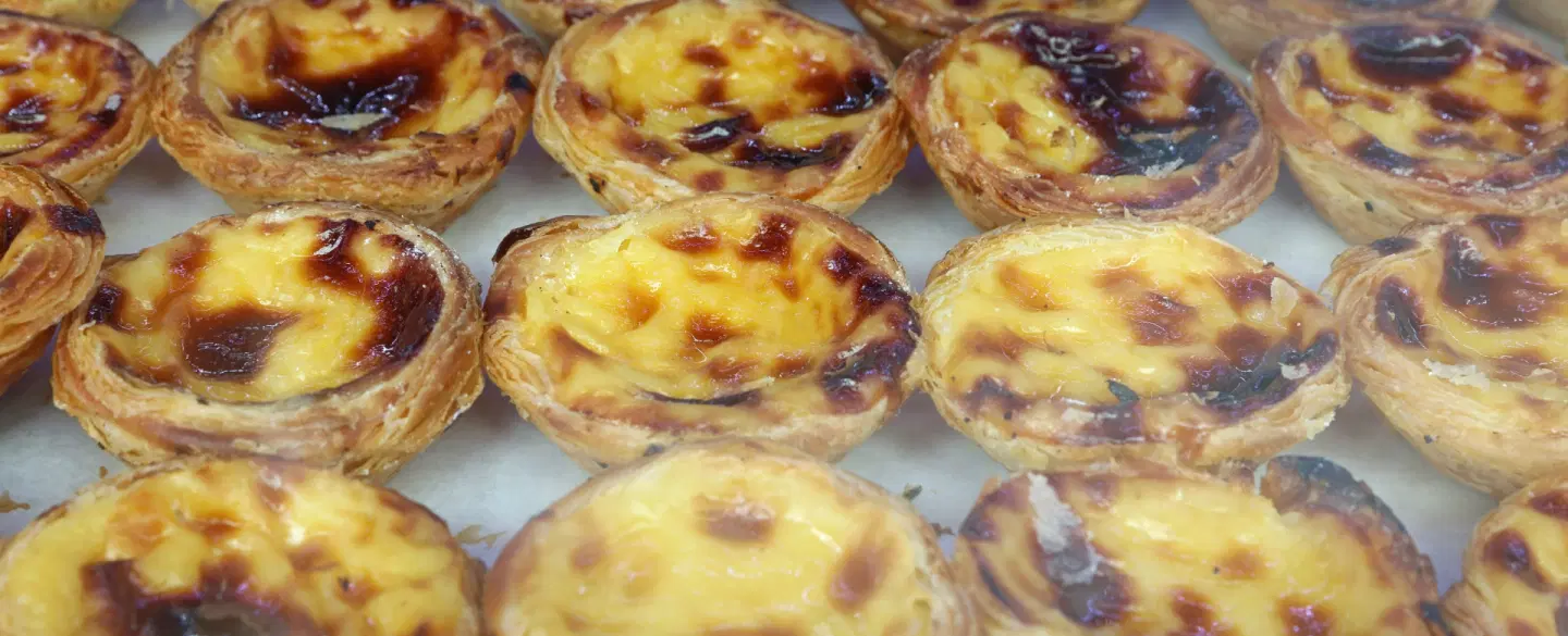 Belém History & Food Tour in Lisbon with Jerónimos Monastery, Belém Tower, and Tagus boat ride.