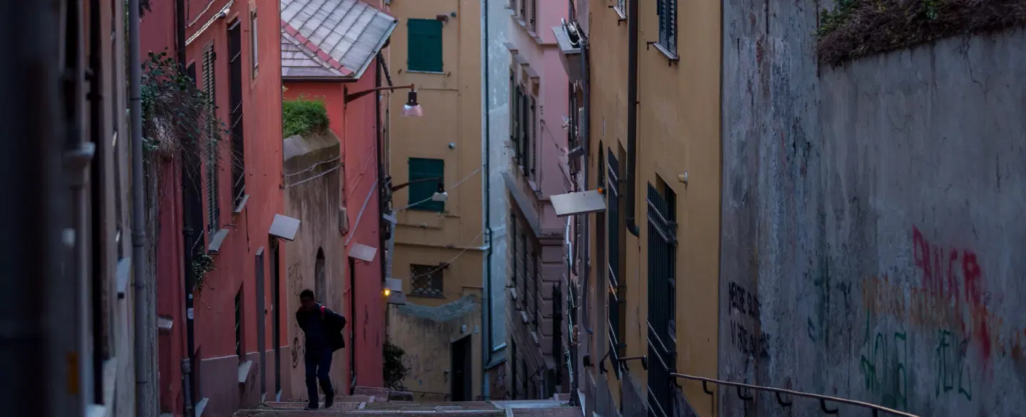 Photo Walk in Genoa’s Caruggi exploring historic alleys and facades on a day trip from Milan.