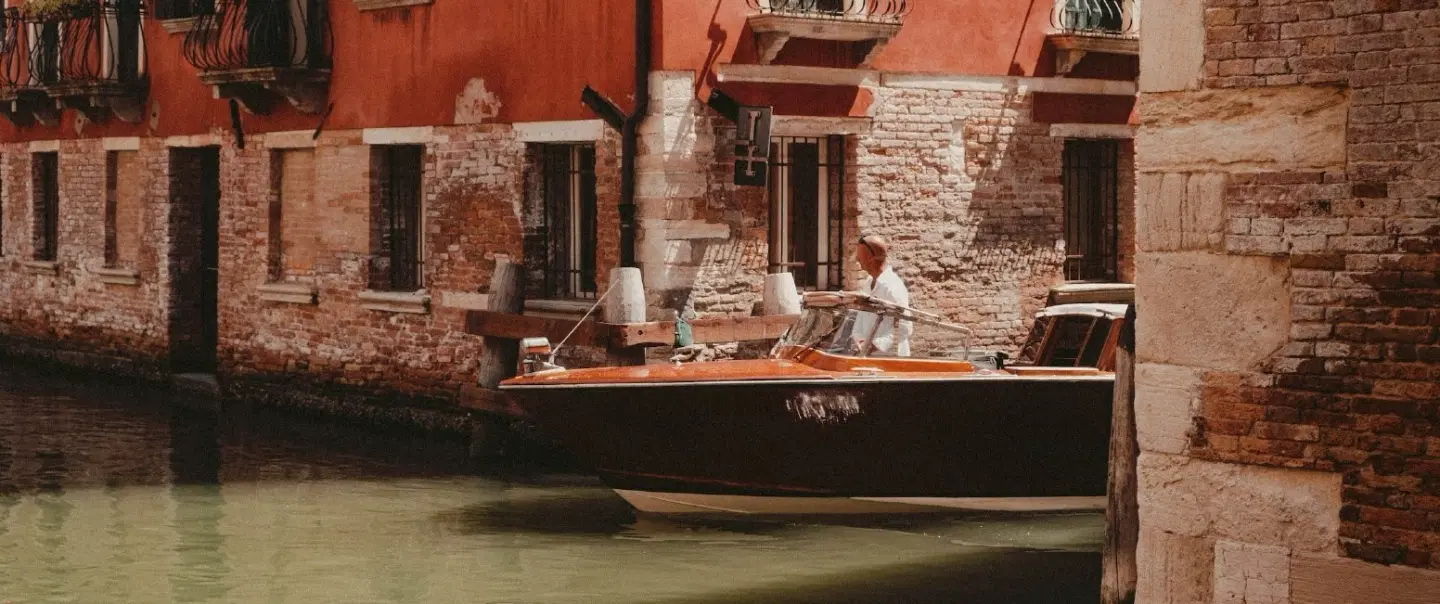 Photo Walk in Venice, discovering hidden canals and authentic life with a skilled photographer.