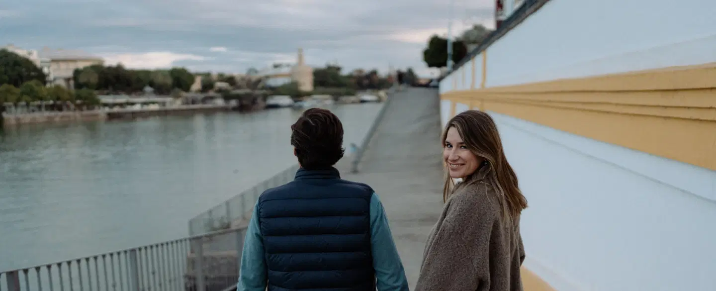 Couples Photo and Video Session in Seville capturing Triana, riverside streets, and local moments.