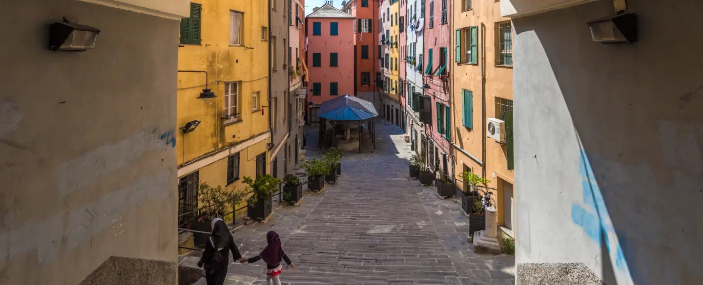 Photo Walk in Genoa’s Caruggi exploring historic alleys and facades on a day trip from Milan.