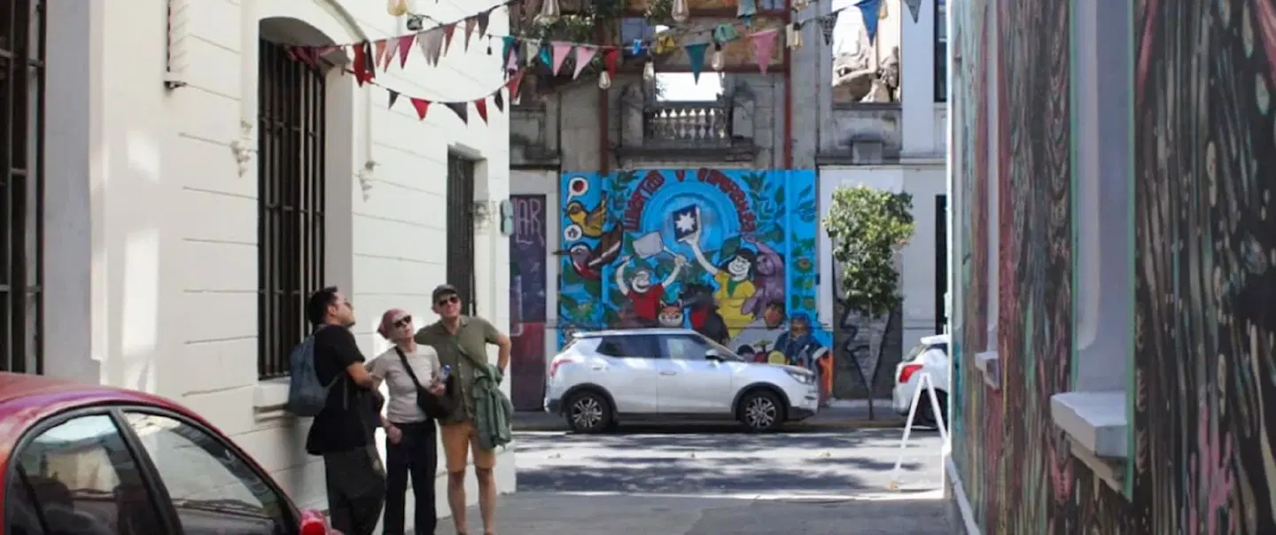 Street Art Walking Tour in Santiago exploring Barrio Yungay murals, artists and local history.