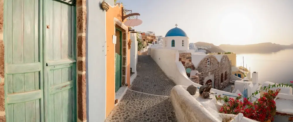 Sightseeing Tour in Santorini exploring villages, caldera views and enjoying local food experiences.