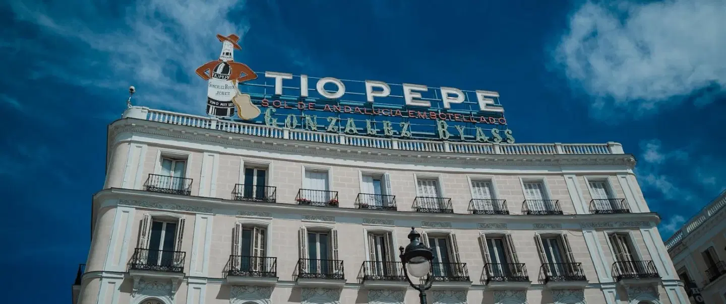 Nightlife Tour in Madrid's Chueca & Malasaña with tapas, wine, history, and local cultural insights.