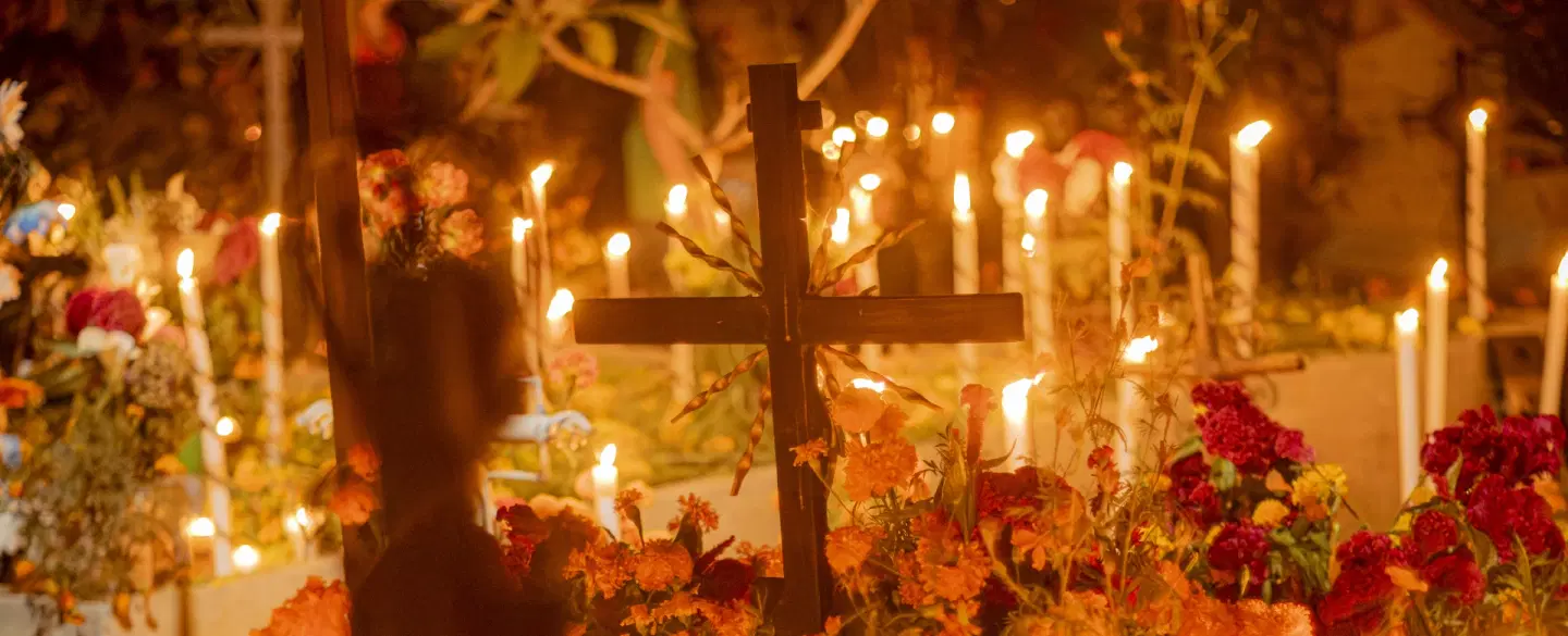 Night Photography Walk in Oaxaca documenting Día de Muertos cemetery rituals by candlelight.