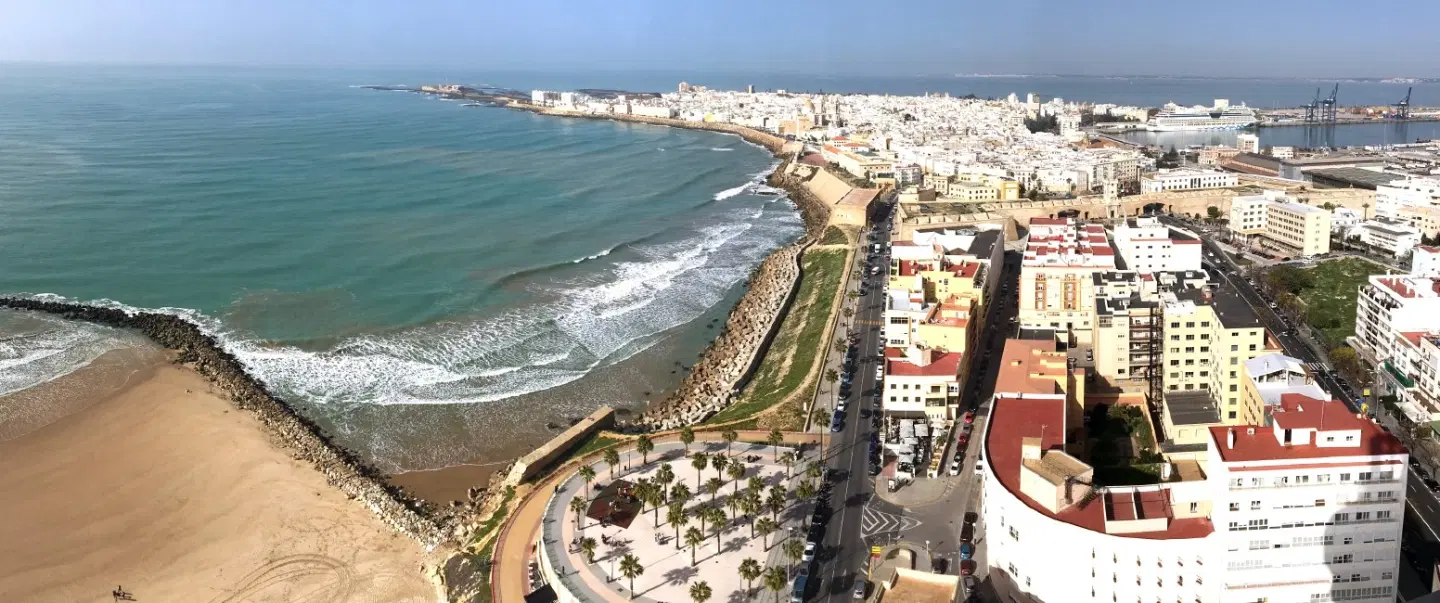 Sailing Tour of Cádiz with historic walk, tapas tasting, artist studio visit, gourmet wine pairing.