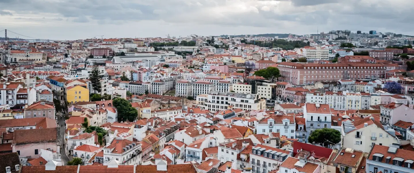 Fado Tour in Lisbon by night with city drive, Alfama walk, and live music in traditional fado house.