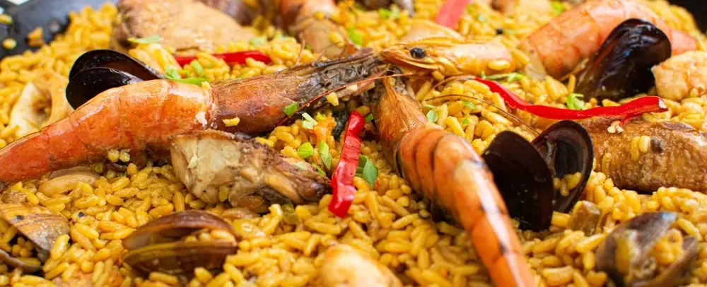 Valencia Mediterranean Food & Wine Tour with Paella, Tapas, Wine Tasting & Historic Center Walk.