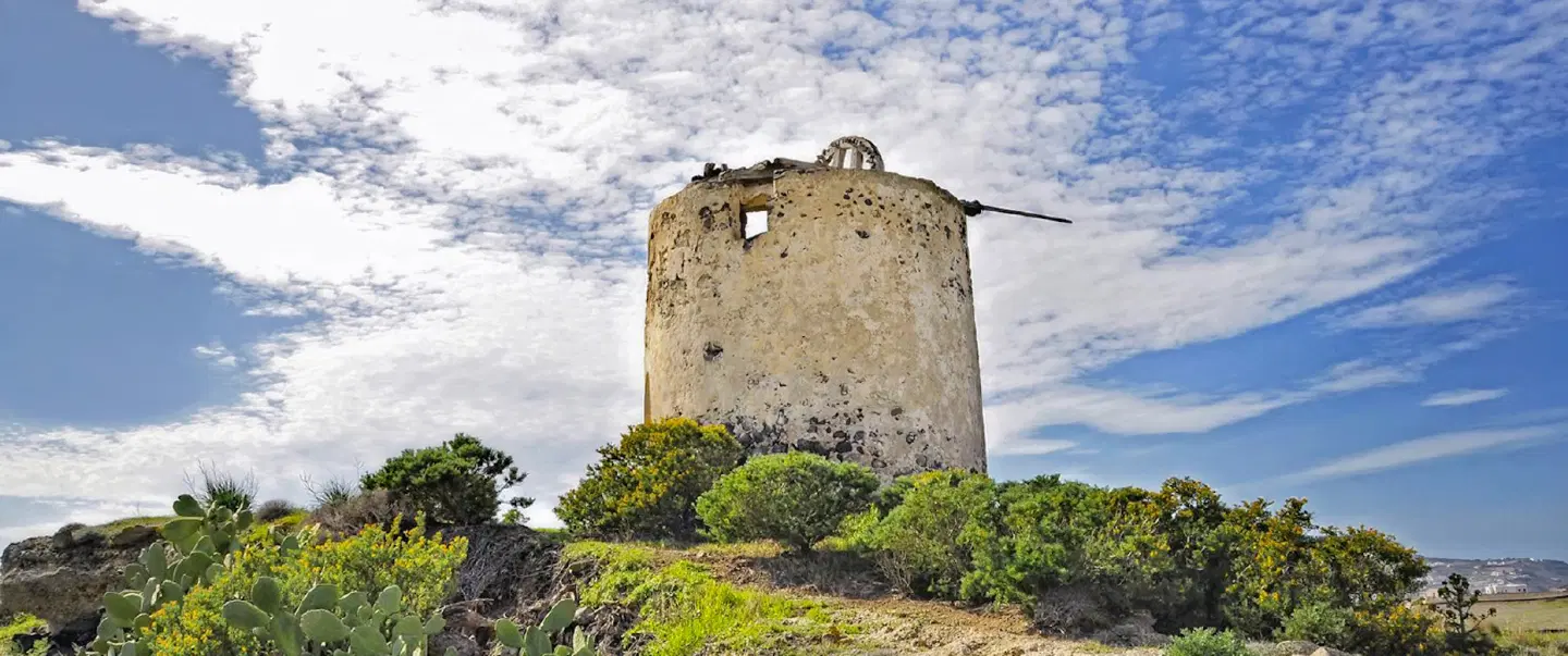 Sightseeing Tour in Santorini with a cave church, quiet villages, scenic views and local history.