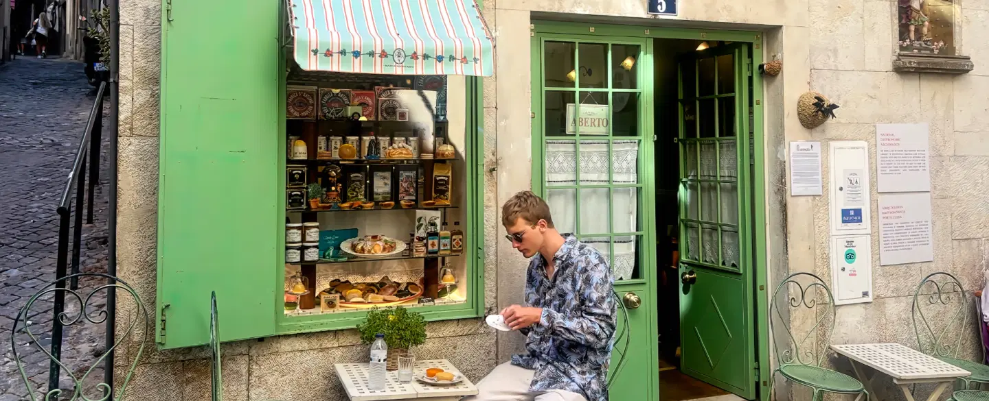 Photo Walking Tour in Alfama, Lisbon, exploring silent alleys, hidden viewpoints, and local haunts.