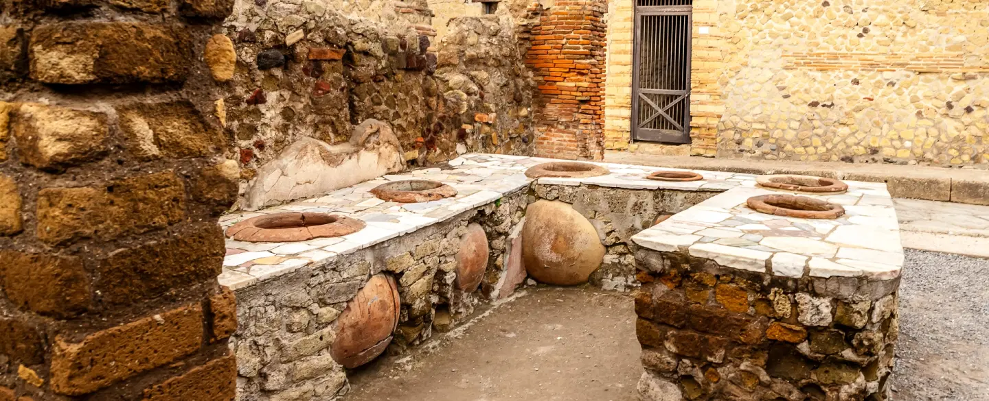 Walking Tour in Herculaneum near Naples, frozen by pyroclastic flows and preserved to this day.
