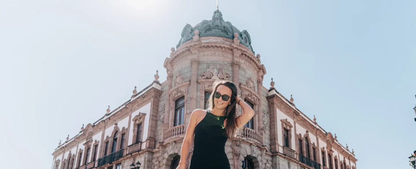 Portrait Photoshoot in historic Jalatlaco in Oaxaca with pastel streets, churches, and murals.