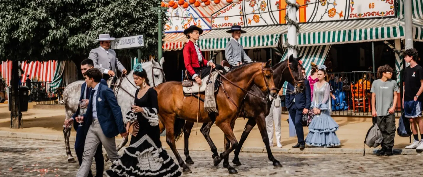 Feria de Abril Tour in Seville: dance class, flamenco styling, carriage ride, private caseta access.