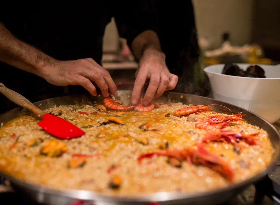 Cooking Workshop in Barcelona’s Gothic Quarter with tapas, wine & hands-on secrets of iconic paella.
