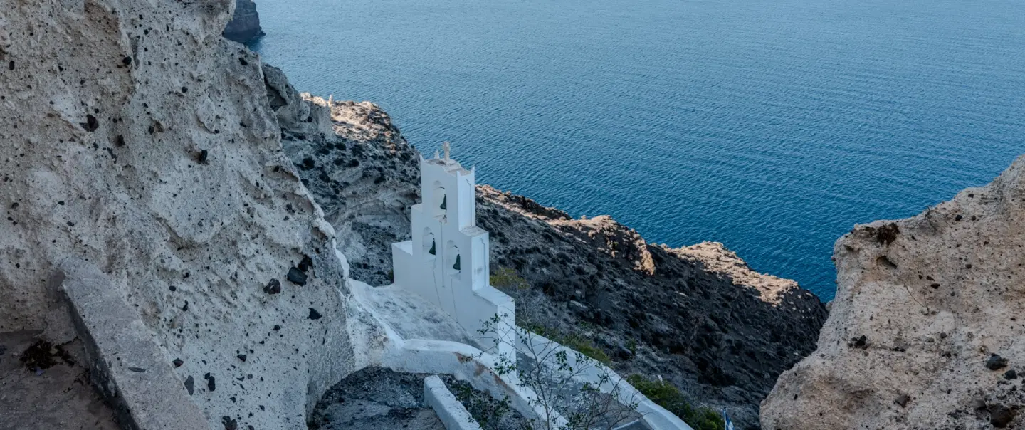 Sightseeing Tour in Santorini with a cave church, quiet villages, scenic views and local history.