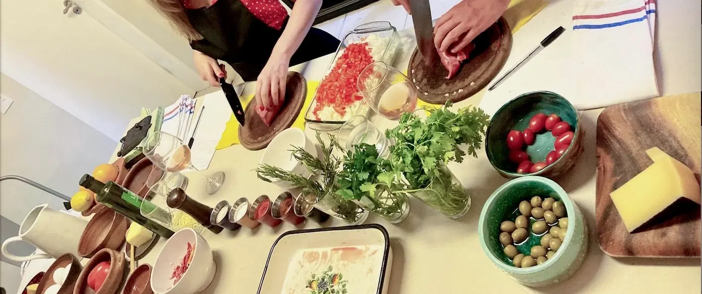 Cooking Class in Buenos Aires making Argentine empanadas in a local home, with wine and dessert.