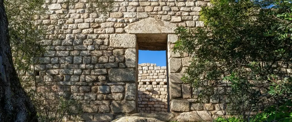 Day Trip in Sardinia’s Gallura exploring ancient sites, olive groves, and traditional cork working.