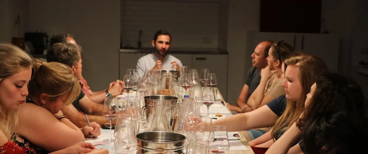 Wine Tasting in Rome, in a private wine club with an expert Italian sommelier guiding the session.