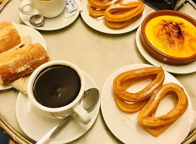 Market Tour with Tastings in Barcelona through Sant Antoni, La Boqueria, and Santa Caterina Markets.