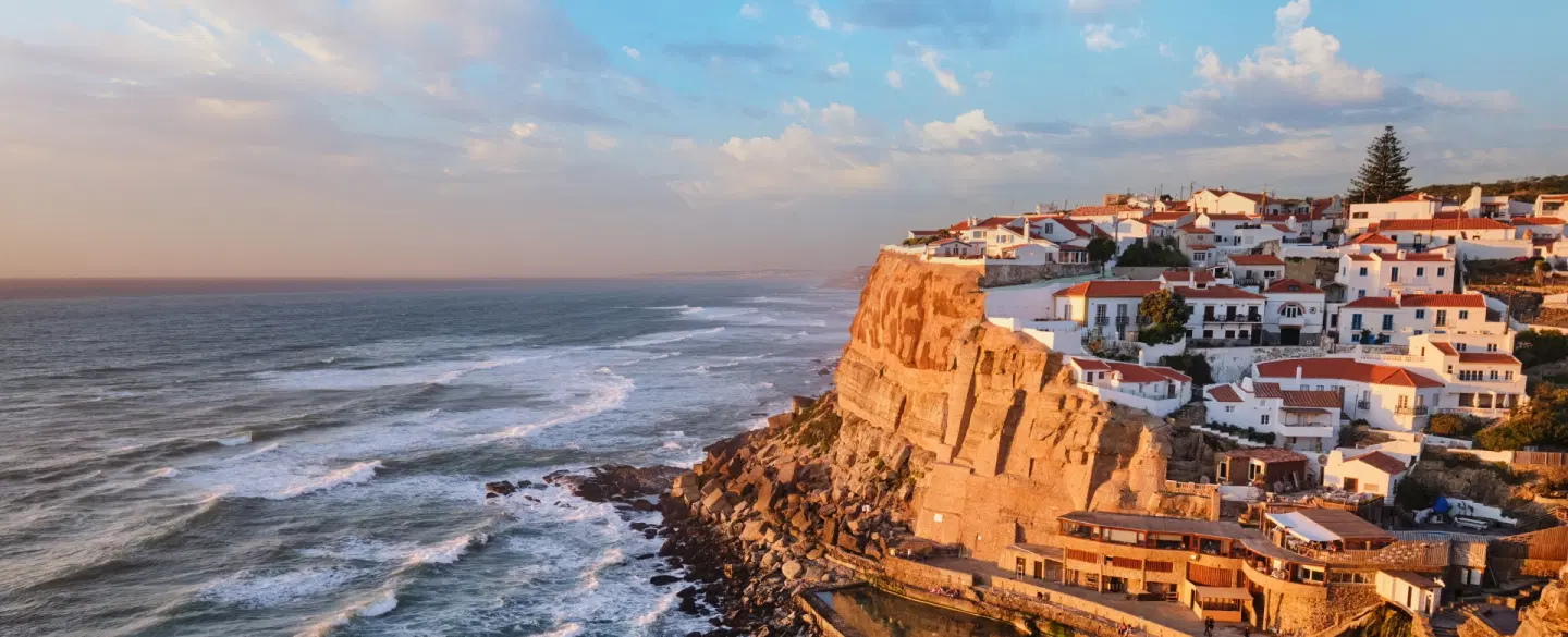 Day Trip from Lisbon to Sintra with pre-opening Pena Palace access and scenic Azenhas do Mar lunch.