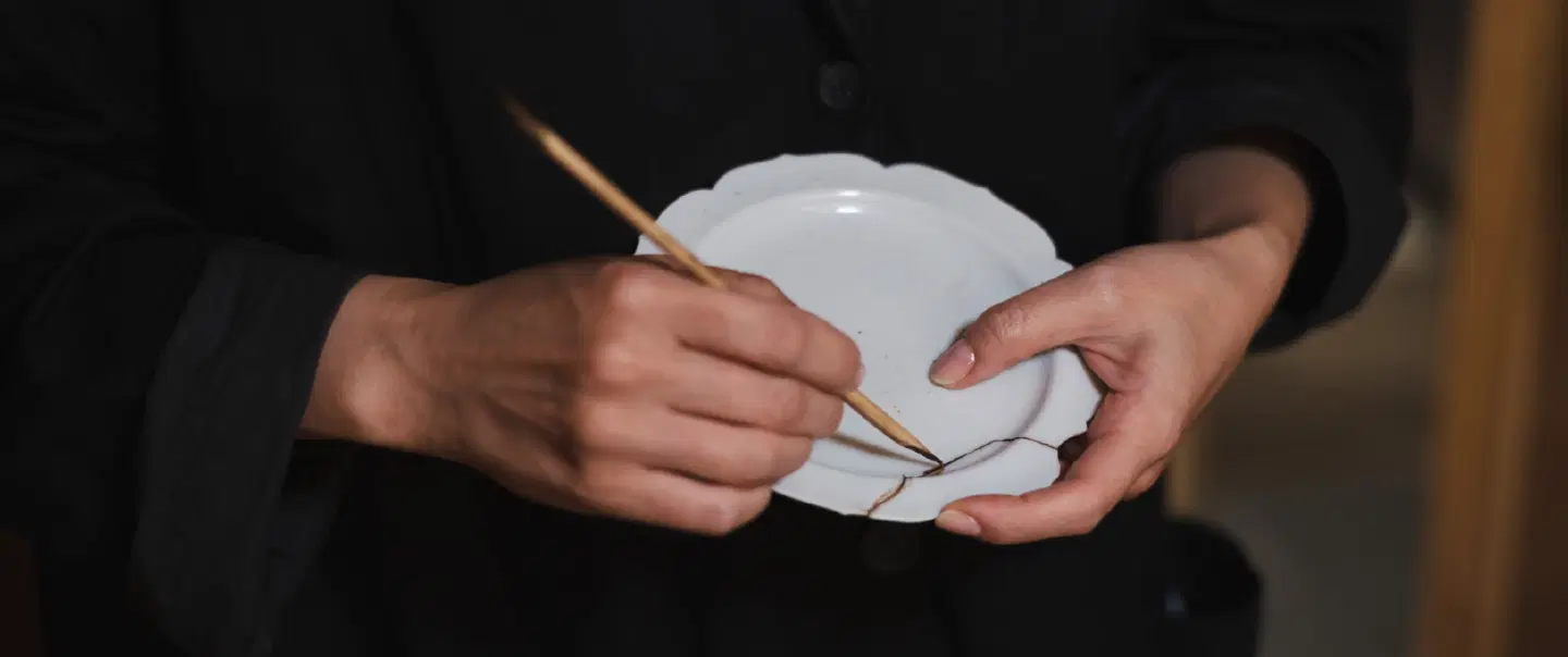 Craft experience in Kyoto learning the art of Kintsugi, and repairing objects with lacquer and gold.