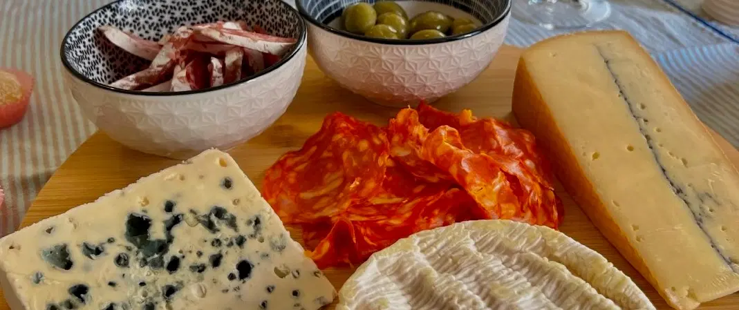 French Wine & Cheese Tasting in Paris: curated regional pairings with a chef in his home kitchen.