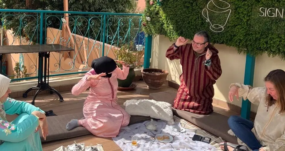 Cooking Class in Marrakesh with deaf chefs—bake Moroccan sweets and support a social-impact café.