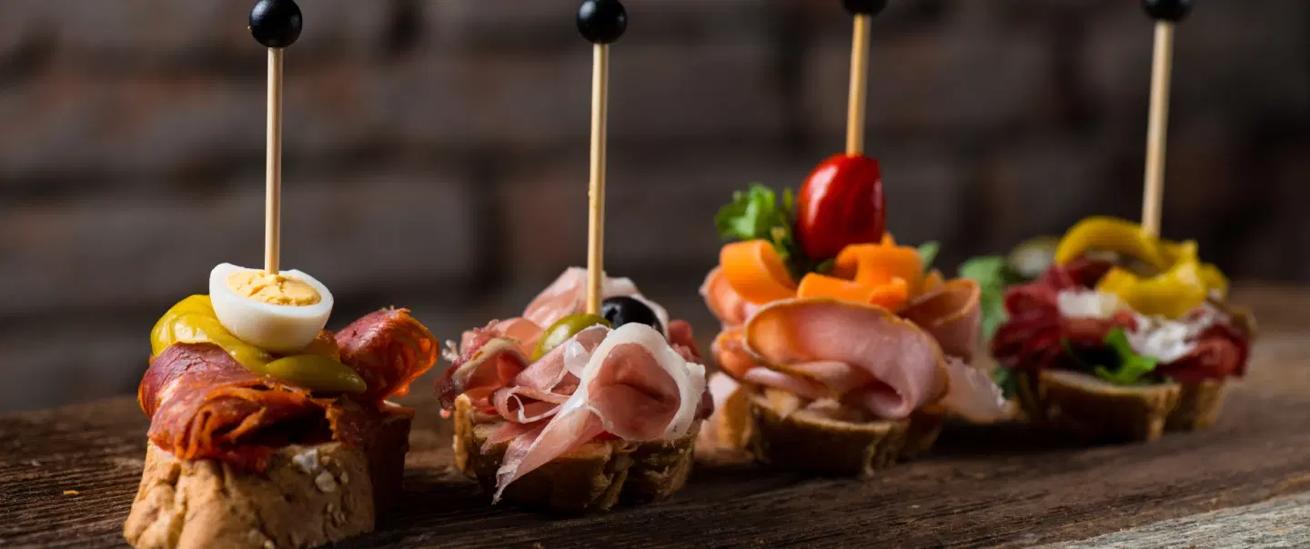 Food Tour in Bilbao, tasting pintxos and local drinks, and exploring history and hidden gems.