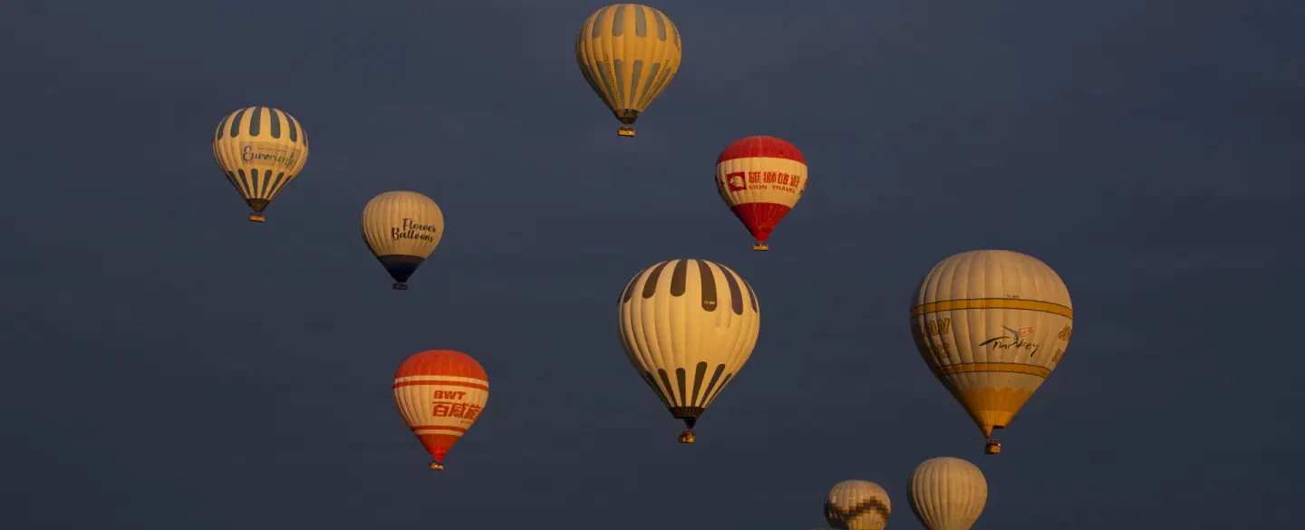 Sunrise Photography Tour in Cappadocia, capturing hot air balloons, valleys, and surreal landscapes.