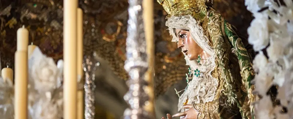 Semana Santa Holy Week Tour in Seville during La Madrugá: Street-level at the Macarena procession.