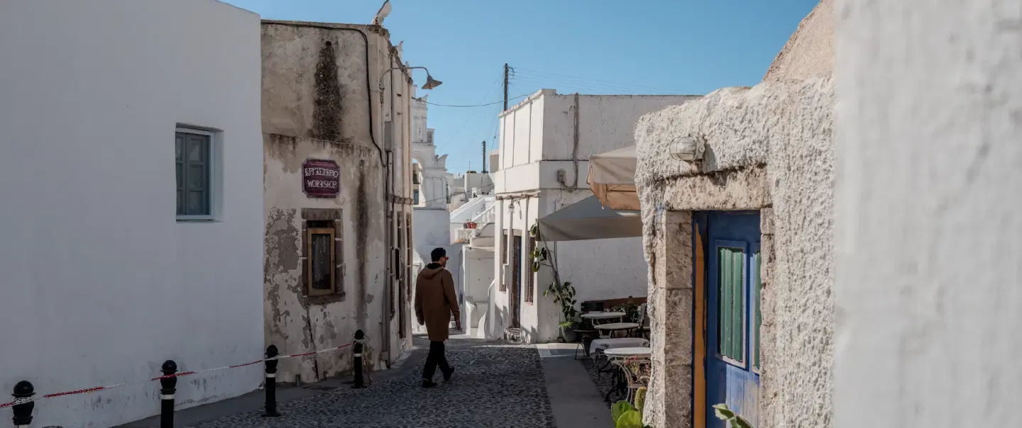Island Tour in Santorini with morning sightseeing and a private sunset cruise along the caldera.