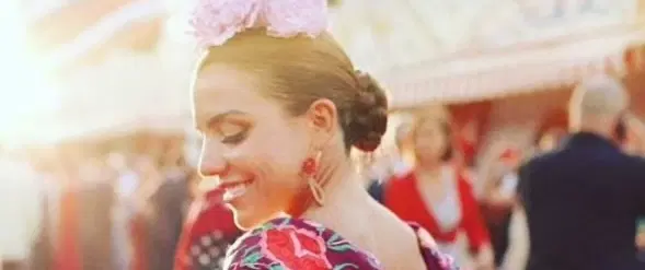 Cultural Experience in Seville: Feria de Abril makeover, flamenco-inspired hair, makeup & flowers.